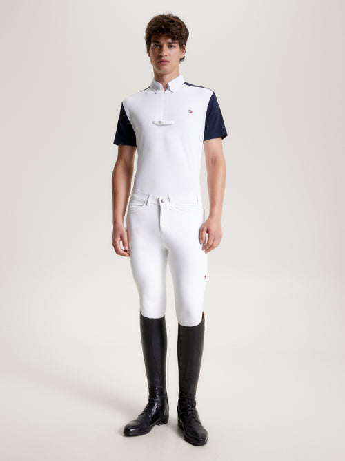 Tommy Hilfiger Equestrian® »Herren Turniershirt Poloshirt Rochester Weiß, mit dem gewissen Etwas. Der Rochester ist im traditionellen „All White“-Stil oder im sportlichen Farbblock-Stil aus atmungsaktivem 4-Wege-Stretch Artikelnummer th13msss705-045 erhältlich bei www.Hotti24.de