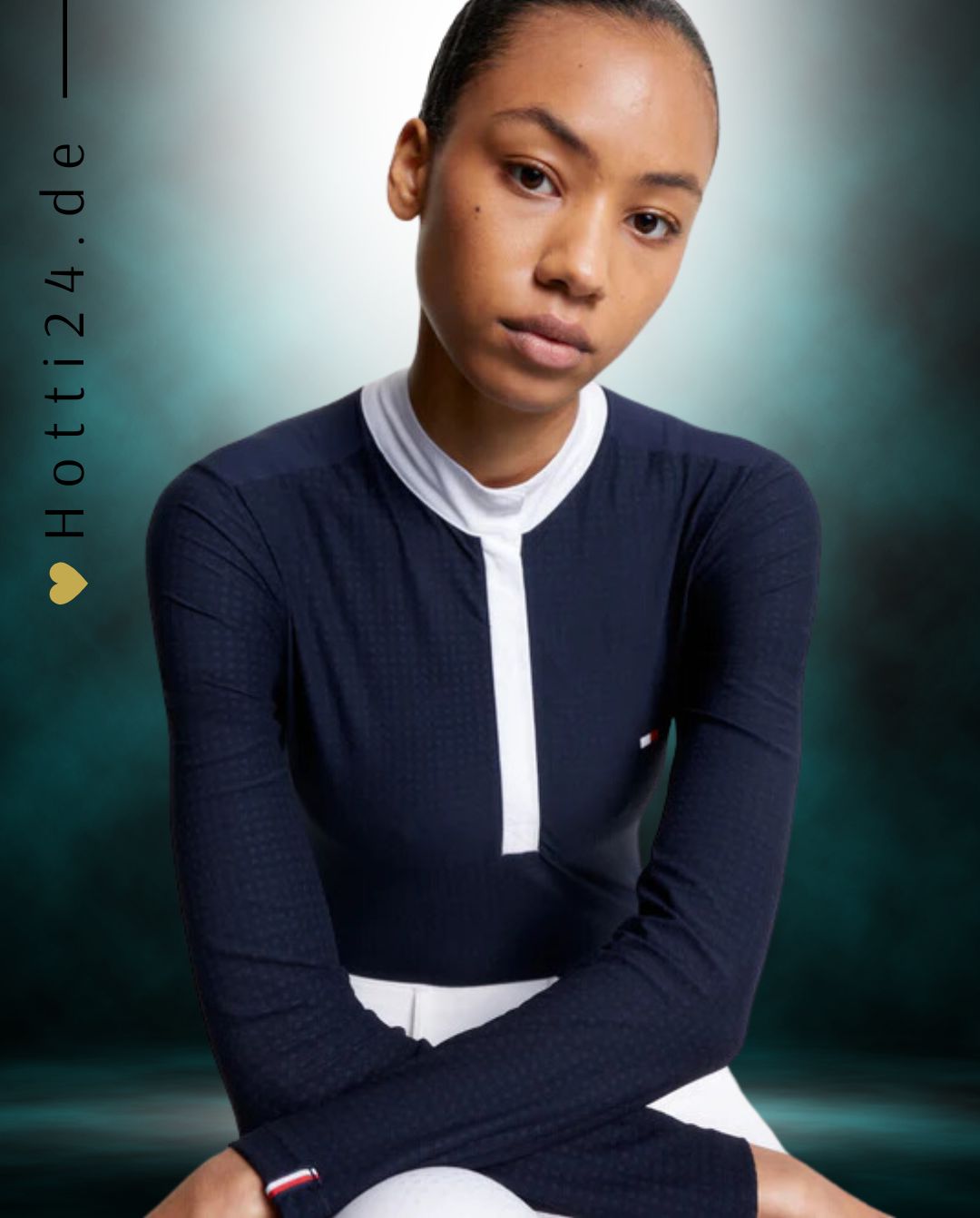 Tommy Hilfiger Equestrian® »Damen Turniershirt Chelsea Blau Langarm, aus einem 4-Wege-Stretchmaterial mit dezenter Textur, das Sie kühl und trocken hält, wenn es darauf ankommt, und einem schicken Stehkragen mit Druckknopfverschluss Artikelnummer th13wsls758-004 erhältlich bei www.Hotti24.de